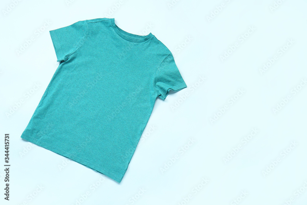 Stylish t-shirt on color background