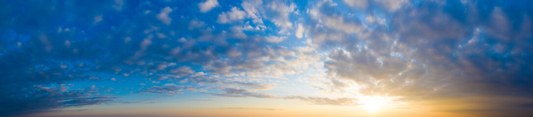 Wall Mural -  Panorama sunrise sky and cloud at morning background image . Panorama sky and cloud.