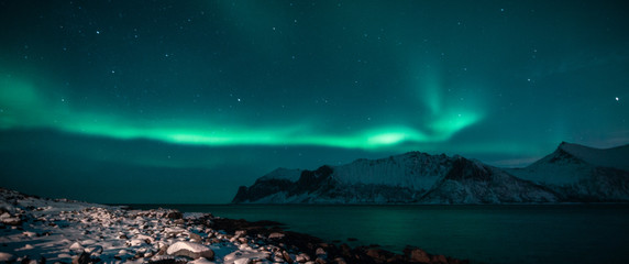 polar lights also called northern lights or aurora borealis in northern norway during winter above a