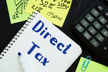 Business concept meaning Direct Tax with sign on the page.