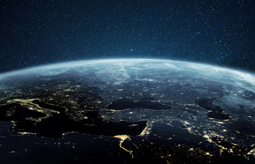 Poster - beautiful planet earth with night city lights. europe and africa at night viewed from space with cit