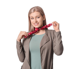 Beautiful young woman with stylish scarf on white background