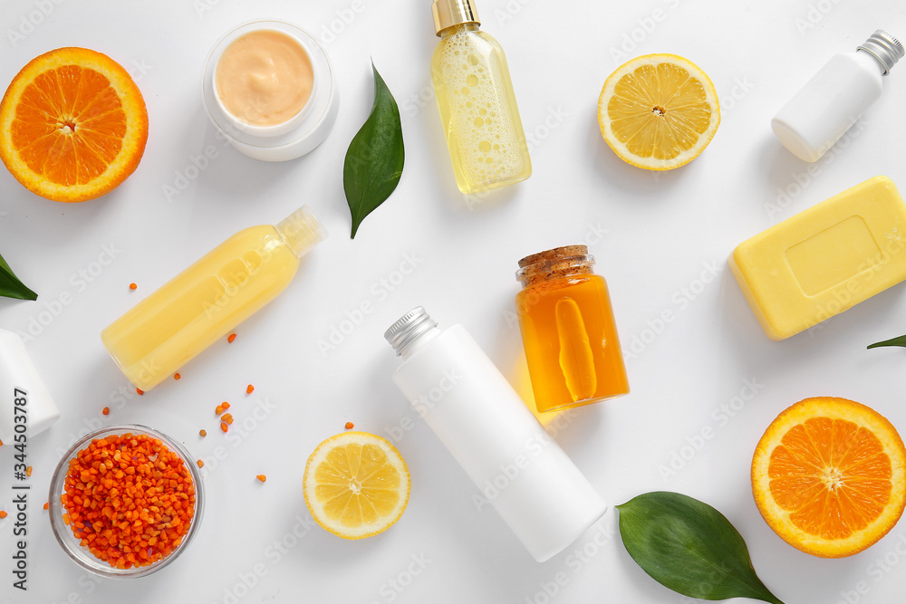 Natural cosmetics with ingredients on white background