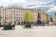 Almost Empty Market Square In Krakow During Pandemic (coronavirus, Covid-19) Time. A Sunny Warm Day In Krakow, Lesser Poland, Poland.
