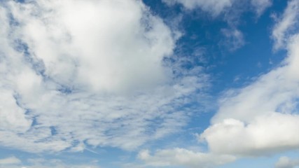 Wall Mural - Qualitative time lapse, movement of beautiful white clouds in blue sky. No flicker, no birds.