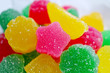 Closeup Vivid Pink Star Shaped Sugar Coated Jelly Candy on Candies Pile	
