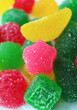Vertical Image of Colorful Fruity Flavor Sugar Coated Jelly Candies for Background or Banner