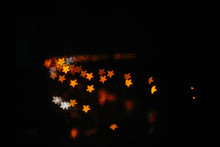 Orange Stars Bokeh.star Shaped Bokeh. Warm Colors