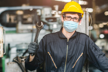 Worker wear disposable face mask for protection Corona Virus Spreading and Smoke dust air pollution filter in factory for healthy labor care.