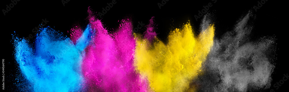 colorful CMYK cyan magenta yellow key holi paint color powder explosion isolated dark black background. printing print business industry manufacturing  beautiful party festival concept - obrazy, fototapety, plakaty 