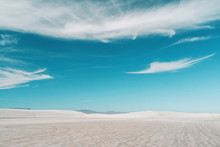Scenic View Of Desert Against Blue Sky