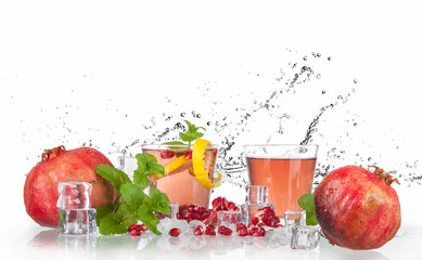 Wall Mural - summer pomegranate drink with lemon and mint with splashed water and ice