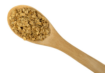 Wall Mural - Top view of a portion of brown sugar oat granola on a spoon