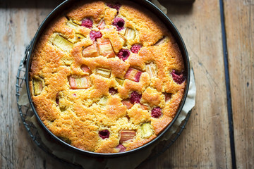 Wall Mural - Orange cake with raspberries and rhubarb 