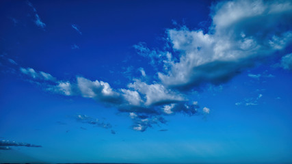 Wall Mural - Blue sky and multiple clouds background