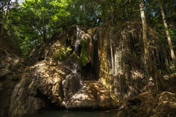 Wall Mural - Air Terjun Semporon or Semporon waterfall is a unique place in Sumbawa island to relax or swim