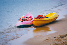 Kayaks Moored At Beach