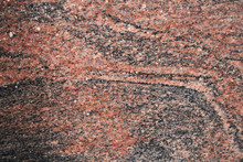 Image Of A Polished Granite Texture Of The Multicolored Type Of Red Color