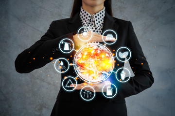 Wall Mural - the world is in the hands of business women with energy resources icon