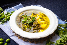 Soup Of Edible Wild Flowers And Berries - Sorrel, Clover, Dandelion, Nettles. Vegan Healthy Food.