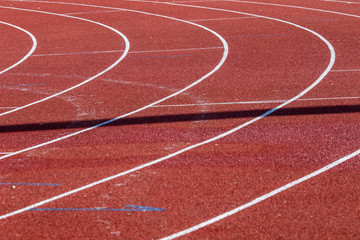 Red running sport track background and texture. Sport running track concept.