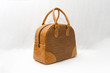 © Plastimaniaco - brown leather bag