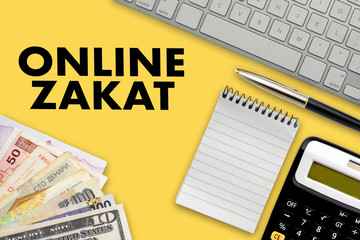 Sticker - ONLINE ZAKAT (islamic tax)  text with notepad, calculator, keyboard, multi banknote or currency and fountain pen on yellow background. Zakat (Charity funds)m Business and Islamic concept