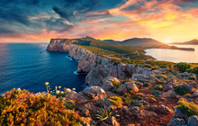 Panotamic View Of Caccia Cape. Astonishing Spring Sunrise On Sardinia Island, Italy, Europe. Attractive Morning Seascape Of Mediterranean Sea. Beauty Of Nature Concept Background.
