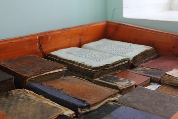 many old books on the table