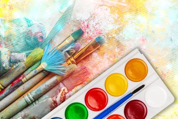 Wall Mural - Artist brushes and paintings with creative art painting