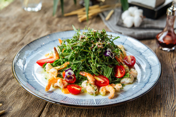Wall Mural - Gourmet salad with arugula and shrimps