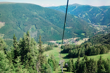 Poster - Panoramic view with cable cars in mountain and blue sky in Bad Kleinkirchheim in Austria