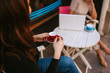 © Dragica - Two girl friends are sitting in a cafe and drinking coffee