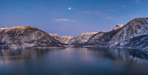 Wall Mural - Aerial drone shot of Obertraun village by Hallstatt lake with mo