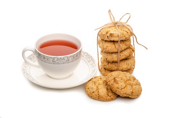 a Cup of tea and homemade, fresh cookies on a white background