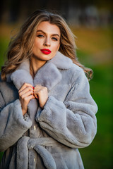 apparel for european winter. elegant woman wear fur coat. stylish lady wear faux fur. versatile text