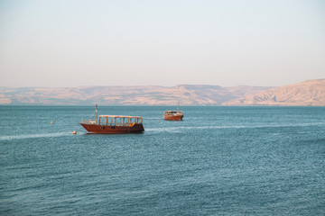 boats on the sea of galilee in israel
