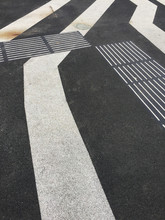 Lines On Asphalt Road With Markings For Blind People