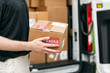 © Sean Locke Photography/Stocksy - Shipment: Man Carries Delivery To Home