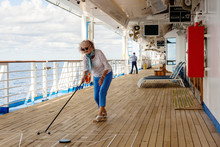 Playing Shuffleboard On A Cruise
