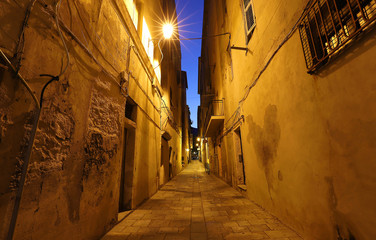 Wall Mural - Street of Corsican city Bastia at night , Corsica island, France.