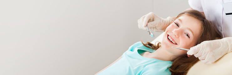 Happy Girl Undergoing Dental Treatment