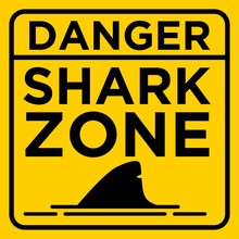 Caution Danger Shark Zone On Beach Yellow Warning Sign