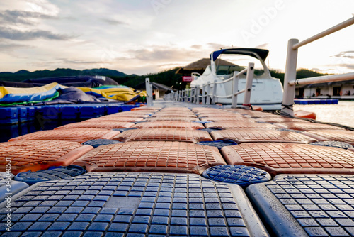 Fotomural theme part floating in middle of the lake, obstacle course race, fun sport activ