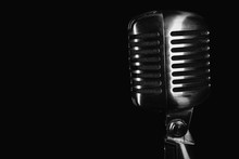 Retro Silver Microphone On Black Background