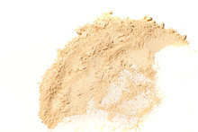 Whitening Mineral Loose Powder.Scattered Tan Colored Facial Loose Powder On White Background.