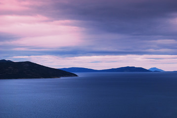 Wall Mural - the sun sets over the islands