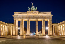 The Famous Illuminated Brandenburg Gate In Berlin At Night