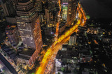 Fototapeta Miasto - Aerial view of Asoke intersection and sky train station in Bangkok Thailand