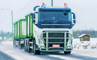 Poster - Truck in road in winter Rovaniemi reflex